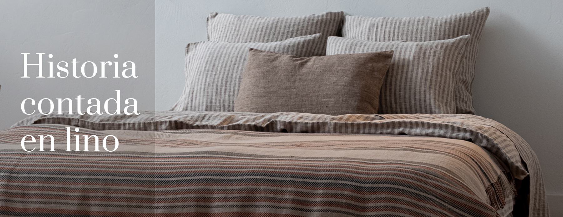 Historia contada en lino – ropa de cama de lino natural a rayas con cojines.