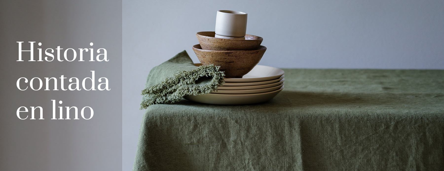 Historia contada en lino – mantel y servilletas de lino verde con cuencos de cerámica.